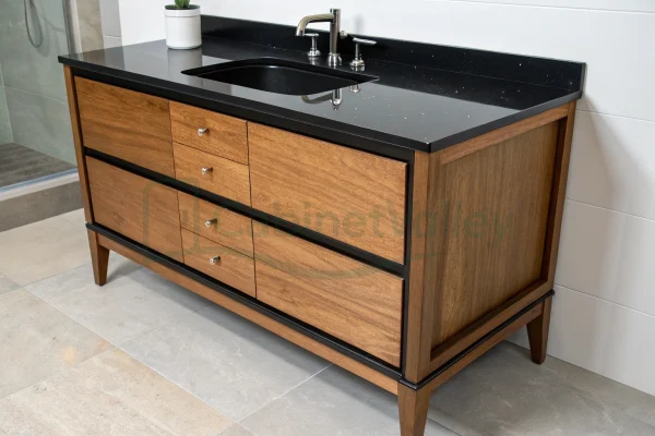 Minimalist freestanding bathroom vanity with clean-lined wood drawers and black quartz countertop