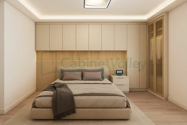 Integrated cream hinged wardrobe system with framed glass doors and concealed upper cabinets, styled within a neutral-toned room emphasizing symmetry and warmth.