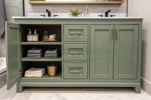 Freestanding sage green bathroom vanity with open shelves and shaker-style doors