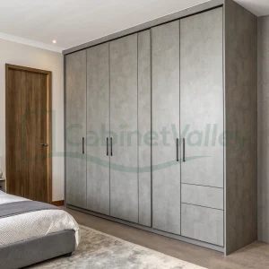 Matte gray wardrobe layout with functional drawers and tall storage units