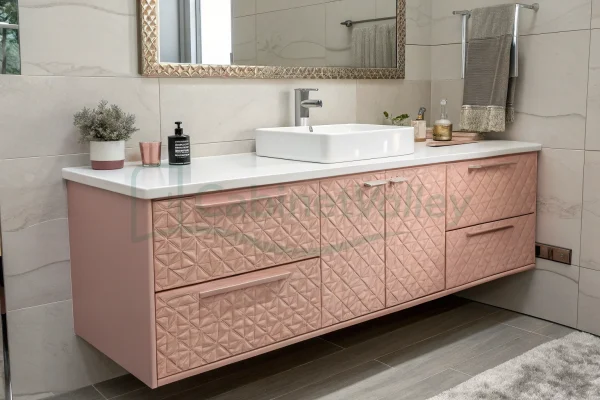 Minimalist blush floating vanity with quilted texture drawers, handle-free design, and seamless integrated countertop.