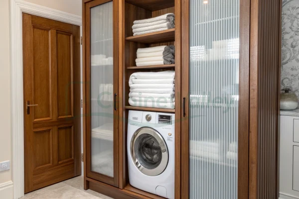 Walnut-finished tall cabinet with open shelves, soft-close drawers, and black-framed frosted glass